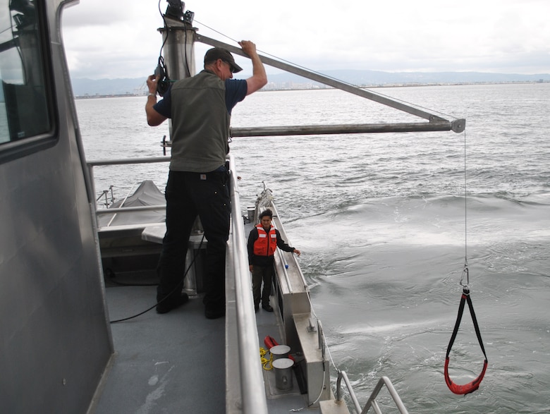 Kixon Meyer, captain of the M/V John A. B. Dillard, Jr., operates a newly-installed davit system May 5. The Dillard crew conducted three days of rescue swimmer training in the San Francisco Bay May 3-5.