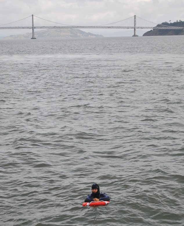 Miguel Nieto, a crewmember of the M/V John A. B. Dillard, Jr., is a man overboard May 5 during a training scenario in the San Francisco Bay. 