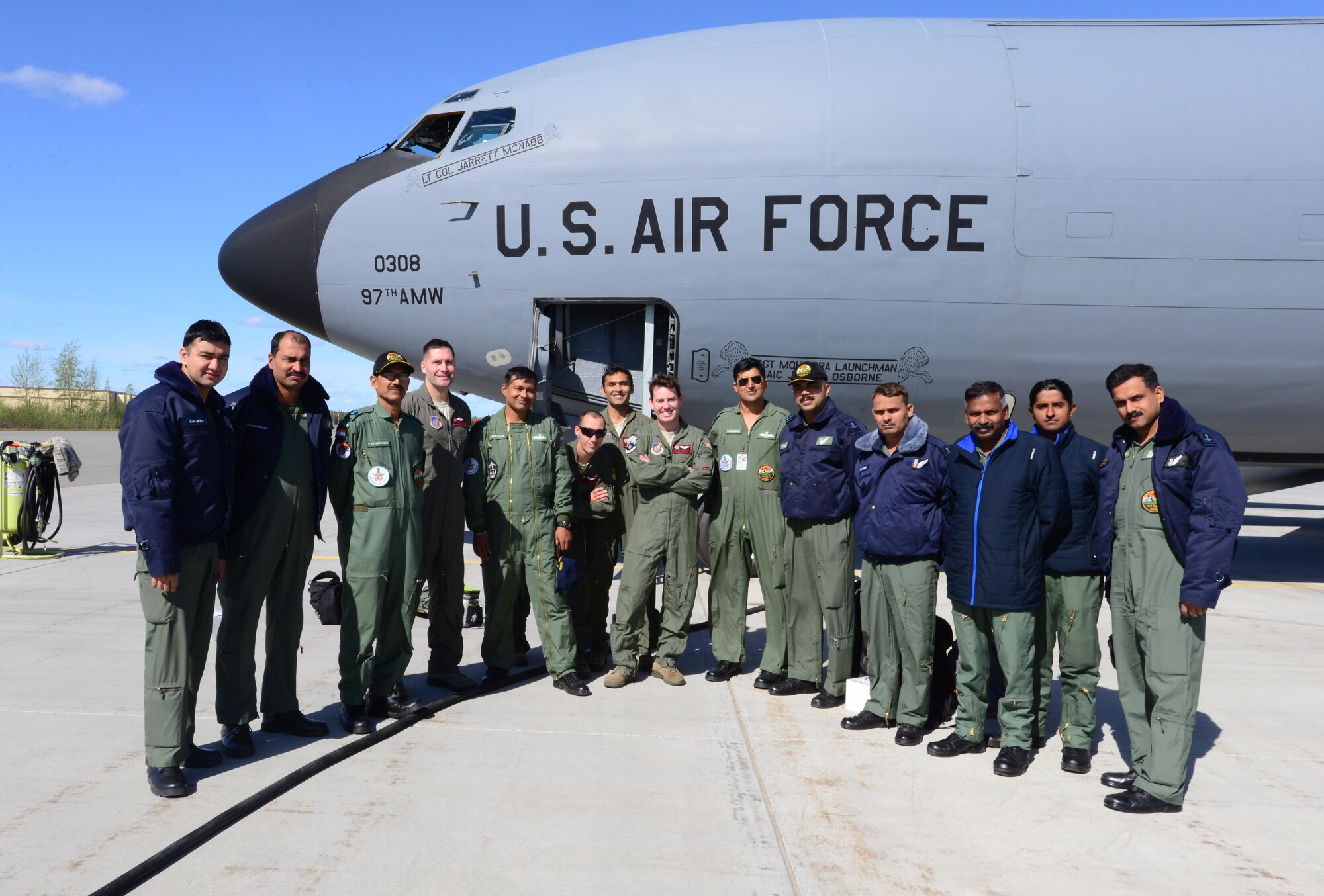 U.S. Air Force Airmen join their Indian Air Force counterparts for a photo May 10, 2016, at Eielson Air Force Base, Alaska. The IAF Airmen participated in an incentive flight during RED FLAG-Alaska 16-1 on a U.S. Air Force KC-135 Stratotanker from the 909th Air Refueling Squadron, Kadena Air Base, Japan. (U.S. Air Force photo by Airman 1st Class Cassandra Whitman/Released)