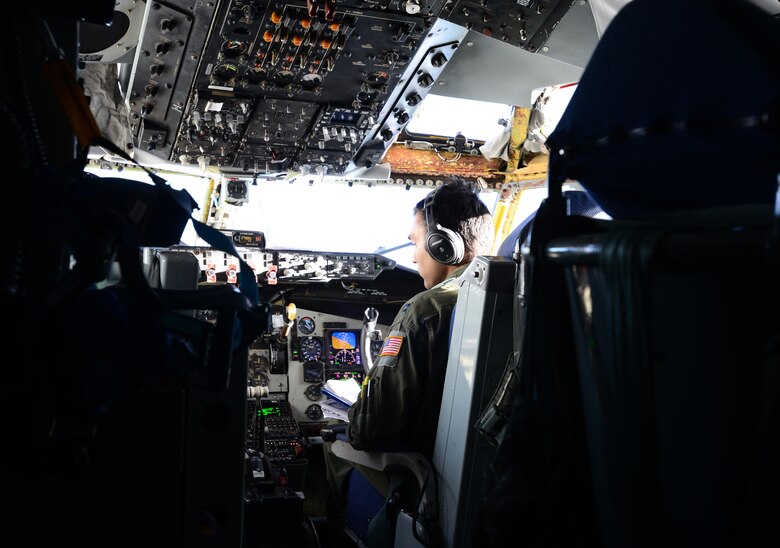 U.S. Air Force Capt. Karan Bansal, a 909th Air Refueling Squadron pilot assigned to Kadena Air Base, Japan, checks over controls May 10, 2016, during a RED FLAG-Alaska 16-1 exercise. The flight was part of an exercise training scenario that also provided an incentive flight for members of the Indian Air Force. (U.S. Air Force photo by Airman 1st Class Cassandra Whitman/Released)