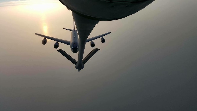 A KC-135 Stratotanker receives fuel from another KC-135, above the ocean, Feb. 25, 2016. The Stratotanker can takeoff with 322,500 pounds of fuel and can offload 200,000 pounds. (Courtesy Photo)