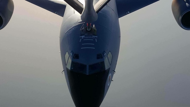 A KC-135 Stratotanker receives fuel from another KC-135, above the ocean, Feb. 25, 2016. The Stratotanker is the backbone of aerial refueling and allows for rapid global mobilization. (Courtesy Photo)