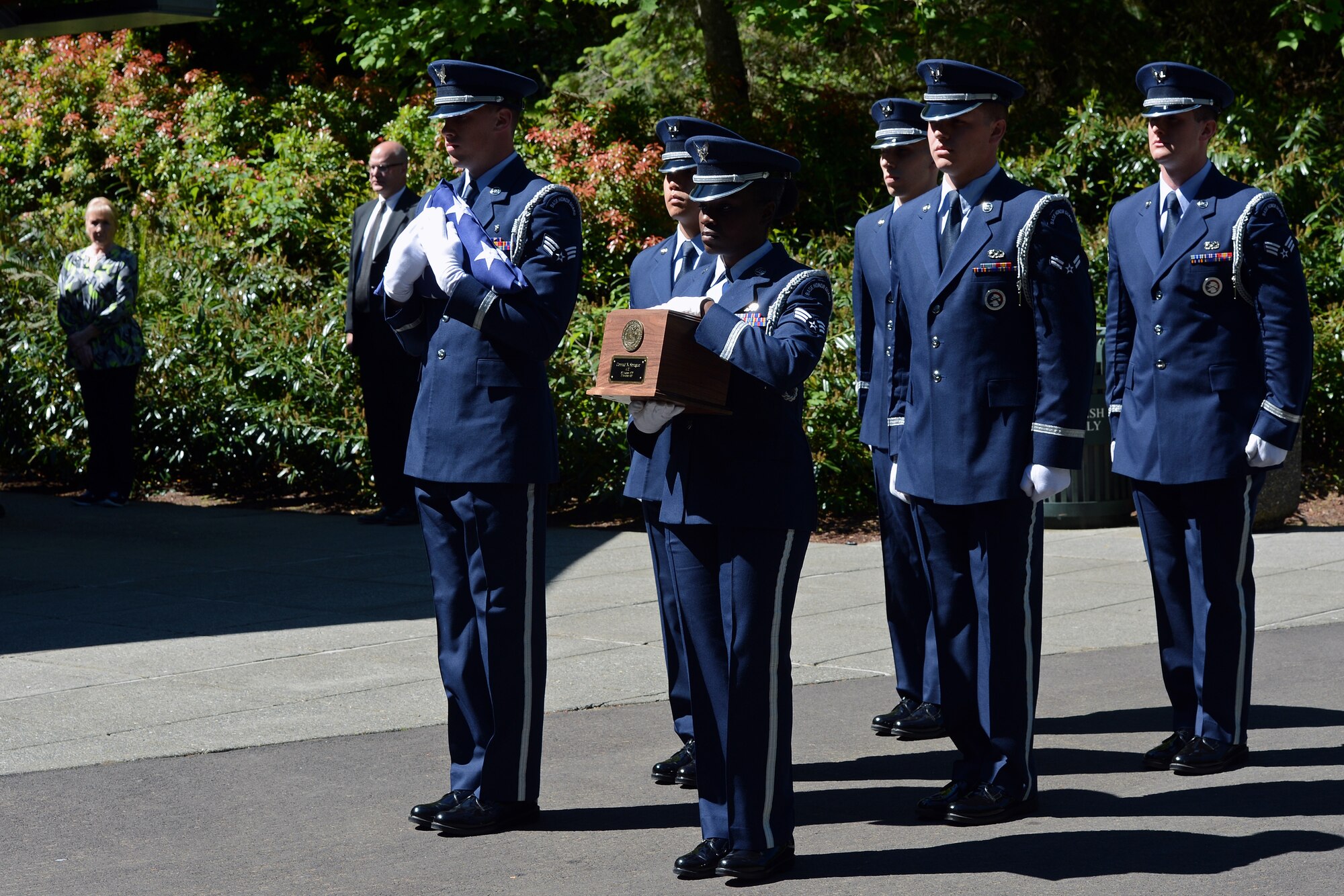Ceremonial guardsmen from the McChord Field Honor Guard, transport the remains of Airman Second Class Conrad Sprague during an honors ceremony May 10, 2016, at Tahoma National Cemetery in Kent, Wash. Sprague was one of 52 Airmen on board a C-124 Globemaster II that crashed on Nov. 22, 1952, into Mount Gannet, Alaska while en route to Elmendorf Air Force Base, Alaska, from McChord AFB, Wash. (U.S. Air Force photo/Senior Airman Jacob Jimenez)