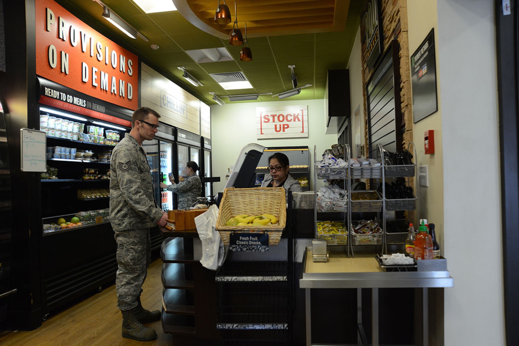Airmen shop at Provisions on Demand, a satellite dining station, at Joint Base Elmendorf-Richardson, Alaska, May 6, 2016. The POD is available for everyone with flight line authorization and can be paid for with the essential-station messing cards. (U.S. Air Force photo by Airman Christopher R. Morales)