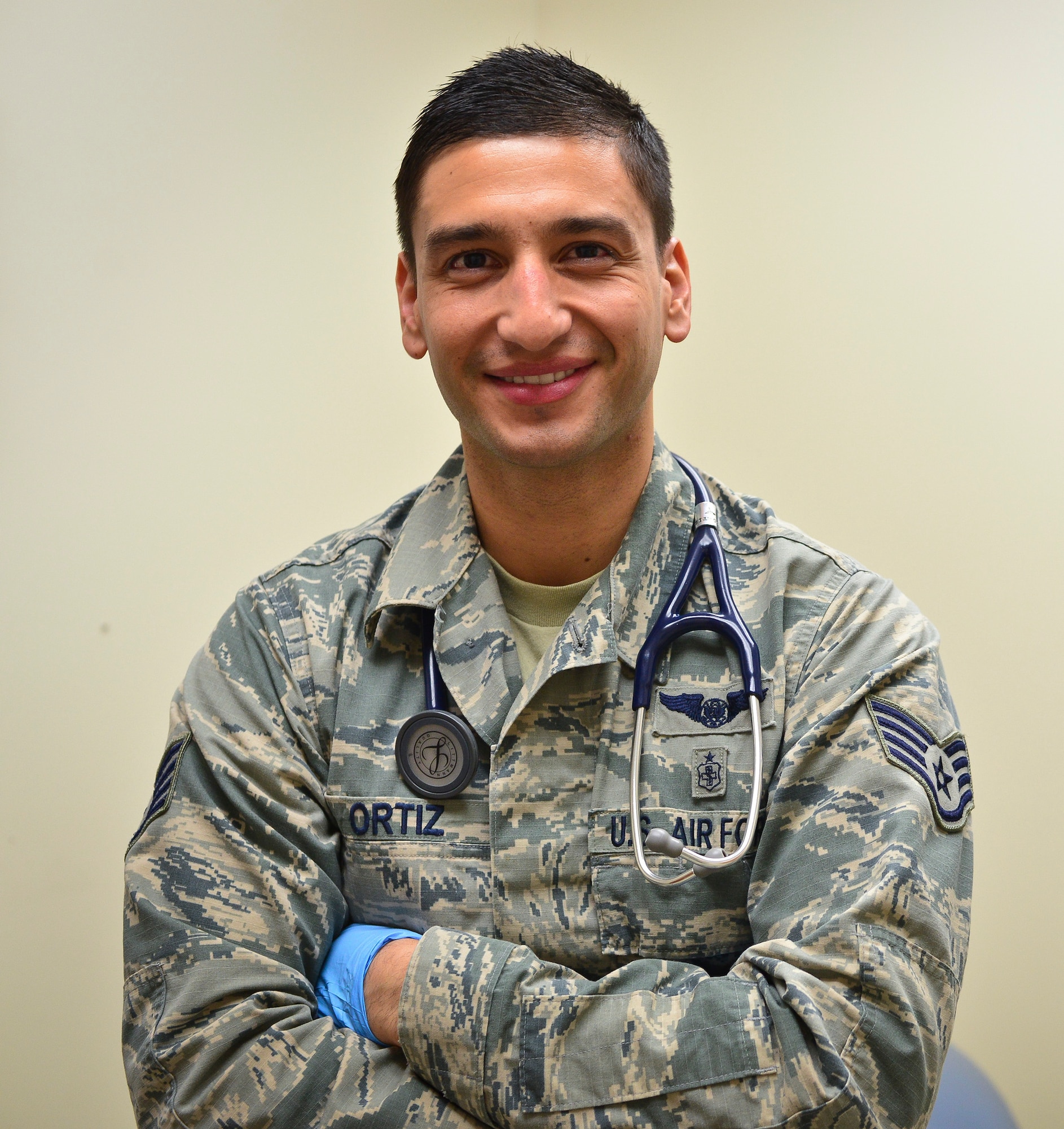 Staff Sgt. Alexander Ortiz, 341st Medical Operations Squadron aerospace medical technician, poses for a photo in the medical clinic May 11, 2016, at Malmstrom Air Force Base, Mont. Ortiz has being selected to commission through the Interservice Physician Assistant Program. (U.S. Air Force photo/Airman Daniel Brosam)