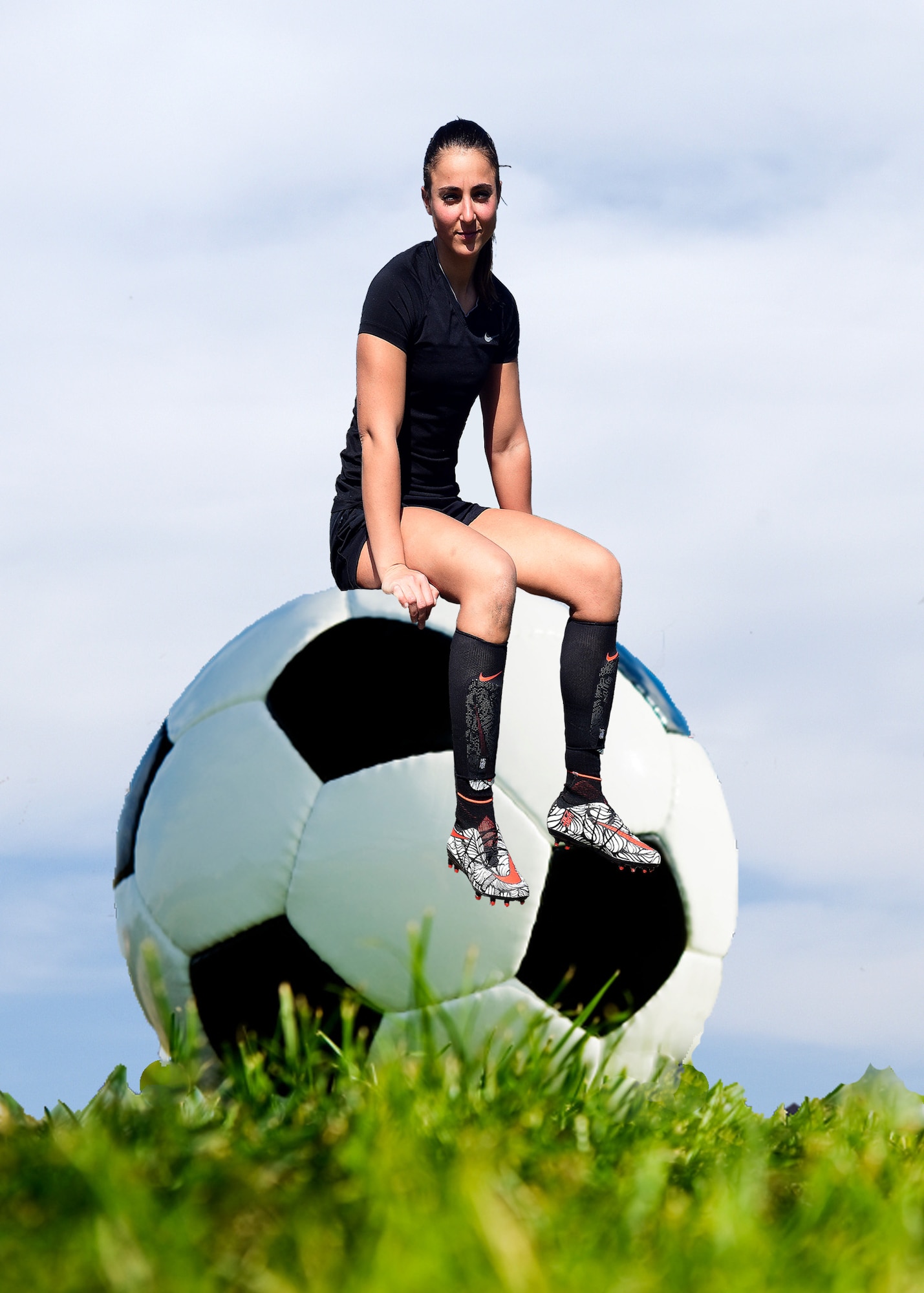 Airman 1st Class Jessica Ortiz-Villa, 741st Missile Security Forces Squadron tactical response force member, displays her love for soccer May 1, 2016, at Malmstrom Air Force Base, Mont. Ortiz-Villa developed the love for soccer when she was younger, and has since been invited to try out for the Armed Forces Soccer Team. (U.S. Air Force illustration/Senior Airman Jaeda Tookes)