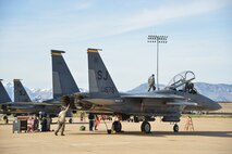 Airmen from the 4th Fighter Wing, Seymour Johnson Air Force Base, N.C., ready an F-15 Strike Eagle aircraft for flight May 4 at Hill AFB, Utah.  The F-15s, along with other fighter and bomber aircraft, participated in the U.S. Air Force air-to-ground weapons evaluation known as Combat Hammer. Combat Hammer, which runs until May 14, tests and validates the performance of crews, pilots and their technology while deploying precision-guided munitions.  (U.S. Air Force photo by R. Nial Bradshaw)