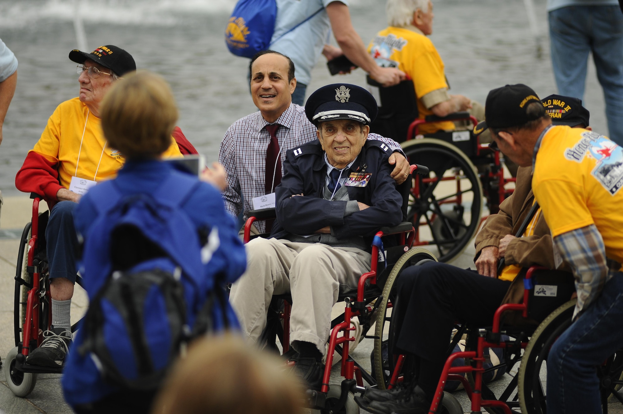 Paul Morell, a World War II Army Air Corps veteran, and his son, Dr. Mark Moore, visit the National World War II Memorial in Washington, D.C., April 30, 2016. Houston Honor Flight was one of many flights to visit the nation’s capital through the Honor Flight Network. (U.S. Air Force photo/Tech. Sgt. Bryan Franks)