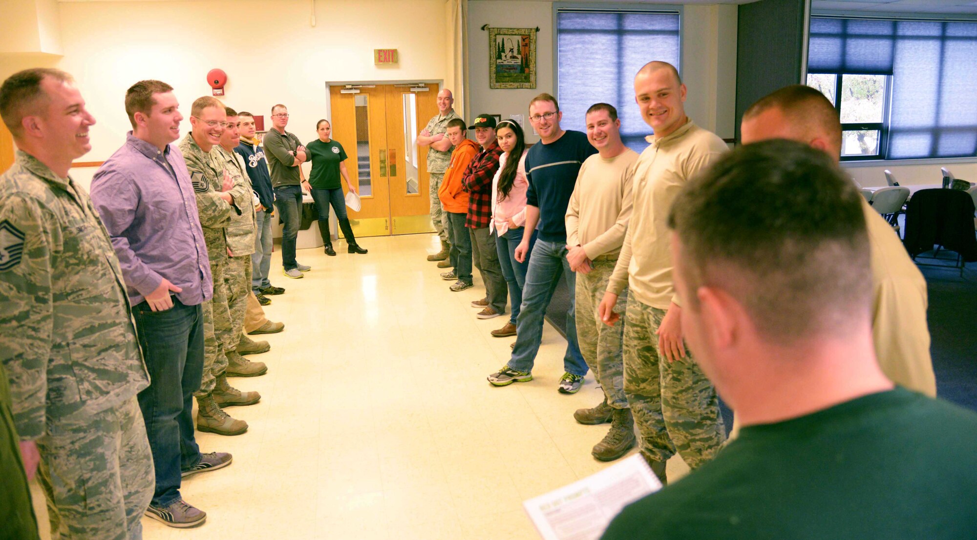 Airmen assigned to the 341st Missile Wing participate in an icebreaker exercise during Green Dot influencer training May 10, 2016, at Malmstrom Air Force Base, Mont. Green Dot is a program which teaches Airmen different techniques to intervene both directly and indirectly in situations of interpersonal violence. (U.S. Air Force photo/Airman 1st Class Magen M. Reeves)