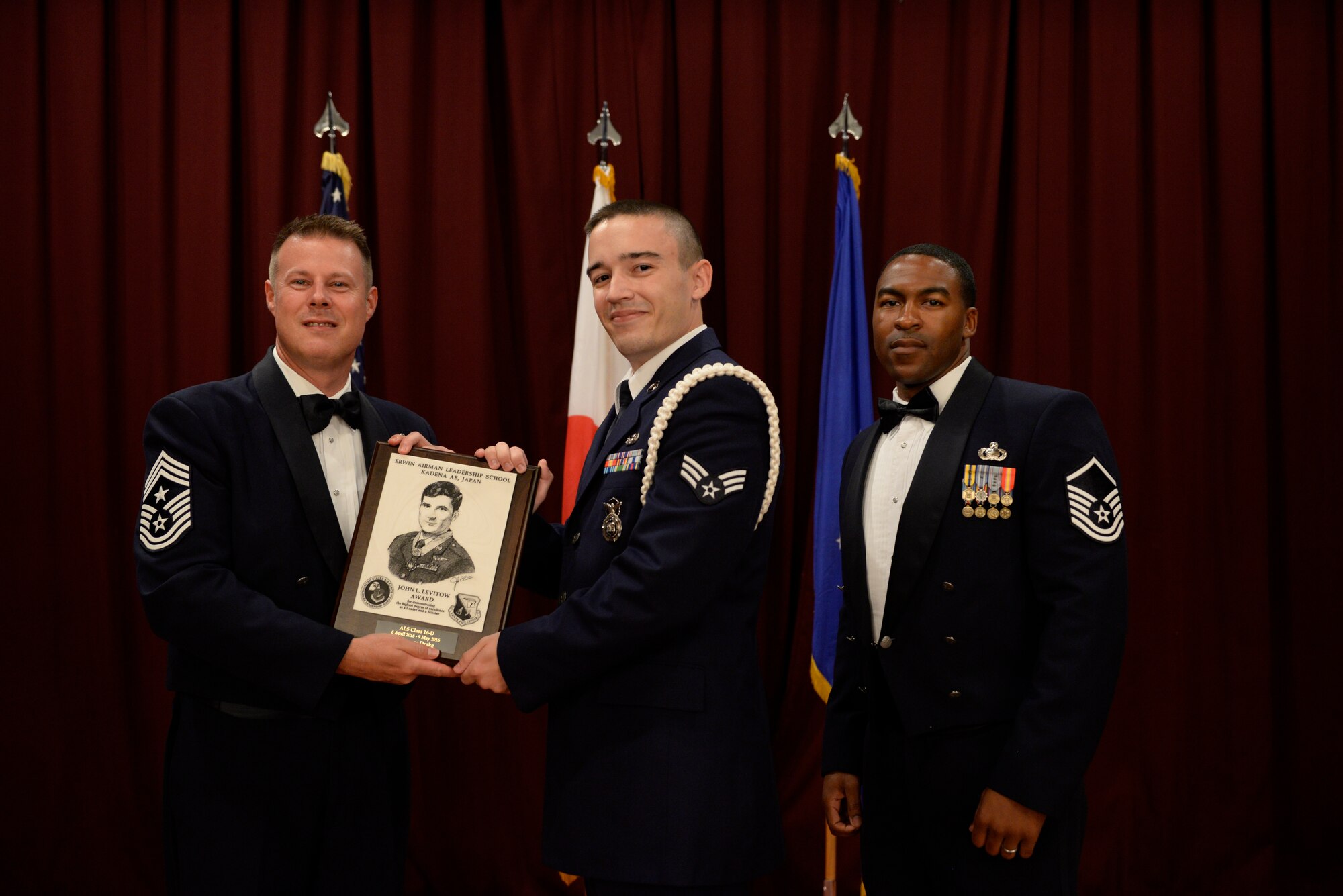U.S. Air Force Senior Airman Lucas Drake, 18th Security Forces Squadron, is the recipient of the John L. Levitow Award during the ALS Class 16-D graduation ceremony May 9, 2016, at Kadena Air Base, Japan. This award is presented to the student who earns the highest average score on evaluations and most embodies the Air Force core values. (U.S. Air Force photo by Senior Airman Stephen G. Eigel)