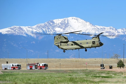 A U.S. Army CH-47 Chinook helicopter lands at Schriever Air Force Base, Colo., May 12, 2016, to transport Defense Secretary Ashton Carter and members of his staff after their visit to the Joint Interagency Combined Space Operations Center (JICSpOC). Carter visited Schriever AFB to participate in discussions on space issues with U.S. Navy Adm. Cecil D. Haney, U.S. Strategic Command commander; Ms. Betty Sapp, National Reconnaissance Office director; U.S. Air Force Gen. John E. Hyten, Air Force Space Command commander; and leaders from the JICSpOC and U.S. Army Space and Missile Defense Command/Army Forces Strategic (SMDC/ARSTRAT). The JICSpOC became operational in October 2015 through the partnership and collaborative efforts of USSTRATCOM, the National Reconnaissance Office, Air Force Space Command, and the intelligence community to enable a greater unity of effort between DoD and the intelligence community as they confront the challenges of operating in space. These capabilities enable a greater unity of effort between DoD and the intelligence community as they confront the challenges of operating in space. One of nine DoD unified combatant commands, USSTRATCOM has global strategic missions, assigned through the Unified Command Plan, which include strategic deterrence; space operations; cyberspace operations; joint electronic warfare; global strike; missile defense; intelligence, surveillance and reconnaissance; combating weapons of mass destruction; and analysis and targeting. (U.S. Air Force Photo by Kathryn Calvert)