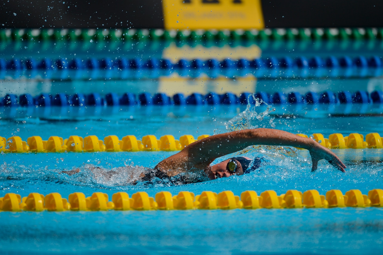 Army Sgt. Elizabeth Marks competes in the 100-meter freestyle event at the 2016 Invictus Games in Orlando, Fla., May 11, 2016. Air Force photo by Tech. Sgt. Joshua L. DeMotts
