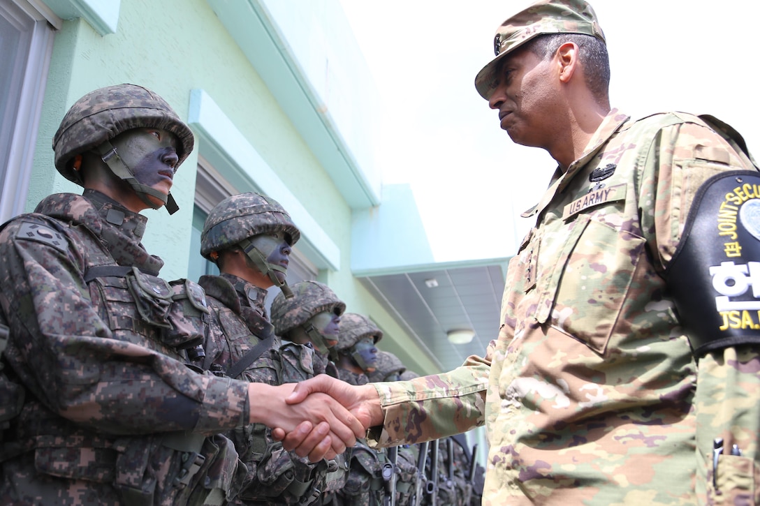 Gen. Vincent K. Brooks, United Nations Command, Combined Forces Command, and U.S. Forces Korea commander, meets with Korean soldiers from the 1st Infantry Division of the ROK Army, during a visit to the DMZ, May 12. (U.S. Army Photo by Sgt. Russell Youmans, Command Photographer)