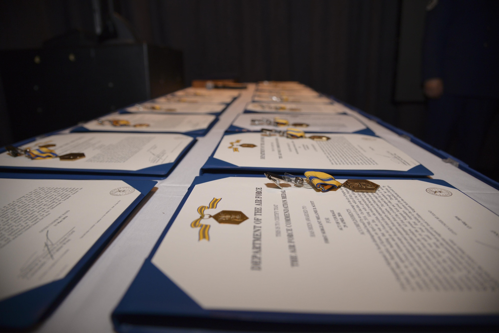 Fifteen awards await presentation during the Songtan fire rescue recognition ceremony at Osan Air Base, Republic of Korea, May 13, 2016. Each Airman and Soldier involved with the rescue received an Air Force Commendation Medal and the civilian received a Command Civilian Award For Valor. (U.S. Air Force photo by Tech. Sgt. Travis Edwards)