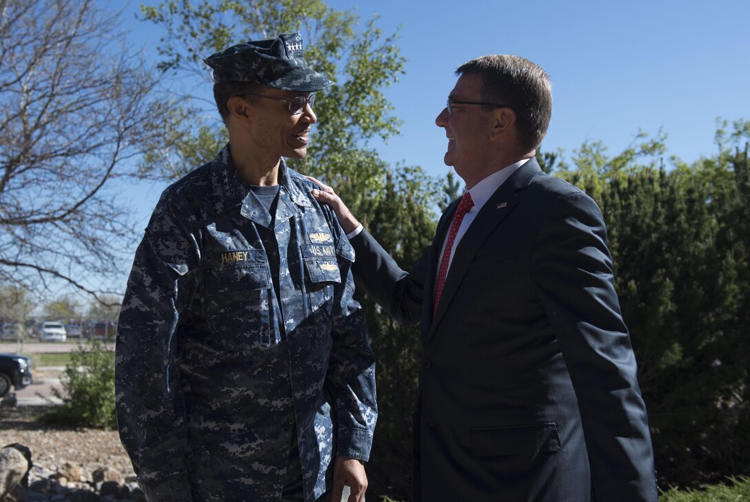 Navy Adm. Cecil D. Haney, commander of U.S. Strategic Command, greets Defense Secretary Ash Carter as Carter arrives at the Joint Interagency Combined Space Operations Center at Schriever Air Force Base, Colo., May 12, 2016. DoD photo by Air Force Senior Master Sgt. Adrian Cadiz
