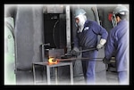 DLA Aviation Richmond's Forging and Casting Action Team led a two-day technology transfer seminar field trip to visit two facilities to see first hand the processes of forging and casting parts, April 19-20, 2016. Shown here, a foundry worker demonstrates forging a metal part at the U.S. Drop Forge company in Woolrich Township, New Jersey. 