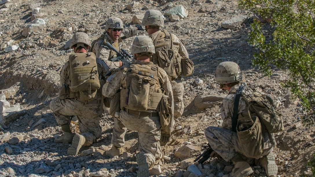 Cpl. John C. Fisher, squad leader, 2nd Battalion, 8th Marine Regiment, leads his Marines through Range 410 while participating in Integrated Training Exercise 3-16 at Marine Corps Air Ground Combat Center, Twentynine Palms, California, May 9, 2016. 2/8 came from Marine Corps Base Camp Lejeune, North Carolina, to participate in ITX 3-16. (Official Marine Corps photo by Lance Cpl. Dave Flores/Released)