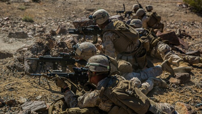 Marines with 2nd Battalion, 8th Marine Regiment, position themselves to lay down suppressive fire at Range 410 while participating in Integrated Training Exercise 3-16 at Marine Corps Air Ground Combat Center, Twentynine Palms, California, May 9, 2016. 2/8 came from Marine Corps Base Camp Lejeune, North Carolina, to participate in ITX 3-16. (Official Marine Corps photo by Lance Cpl. Dave Flores/Released)
