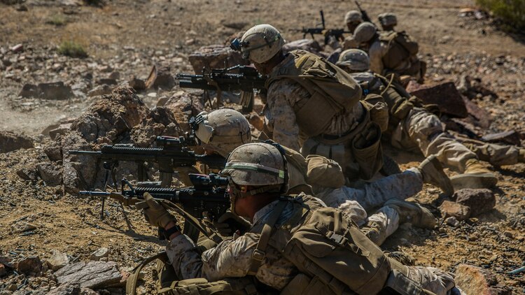 Marines with 2nd Battalion, 8th Marine Regiment, position themselves to lay down suppressive fire at Range 410 while participating in Integrated Training Exercise 3-16 at Marine Corps Air Ground Combat Center, Twentynine Palms, California, May 9, 2016. 2/8 came from Marine Corps Base Camp Lejeune, North Carolina, to participate in ITX 3-16. (Official Marine Corps photo by Lance Cpl. Dave Flores/Released)