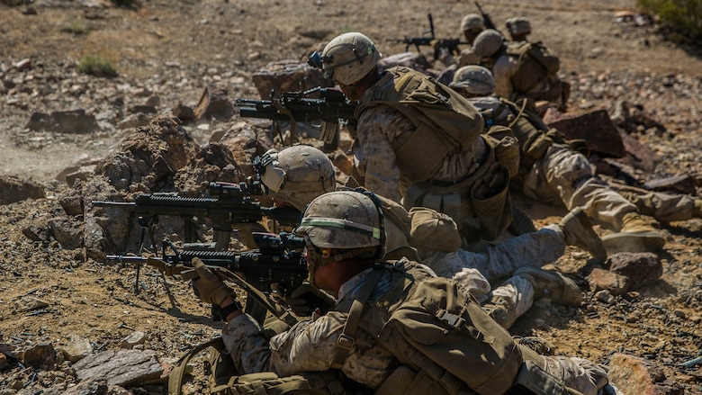 Marines with 2nd Battalion, 8th Marine Regiment, position themselves to lay down suppressive fire at Range 410 while participating in Integrated Training Exercise 3-16 at Marine Corps Air Ground Combat Center, Twentynine Palms, California, May 9, 2016. 2/8 came from Marine Corps Base Camp Lejeune, North Carolina, to participate in ITX 3-16. (Official Marine Corps photo by Lance Cpl. Dave Flores/Released)