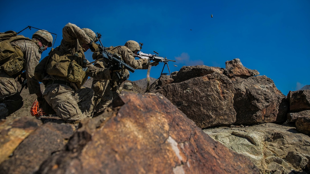 Marines with 2nd Battalion, 8th Marine Regiment, lay down suppressive fire at Range 410 while participating in Integrated Training Exercise 3-16 at Marine Corps Air Ground Combat Center, Twentynine Palms, California, May 9, 2016. 2/8 came from Marine Corps Base Camp Lejeune, North Carolina, to participate in ITX 3-16. (Official Marine Corps photo by Lance Cpl. Dave Flores/Released)