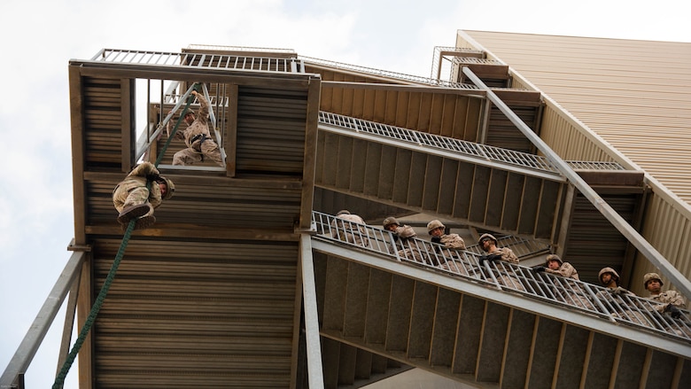 U.S. Marines and British Royal Marines practice fast-roping techniques at Marine Corps Camp Pendleton May 9, 2016. This training was a part of a helicopter rope suspension techniques training package facilitated by 1st Air Naval Gunfire Liaison Company, I Marine Expeditionary force.