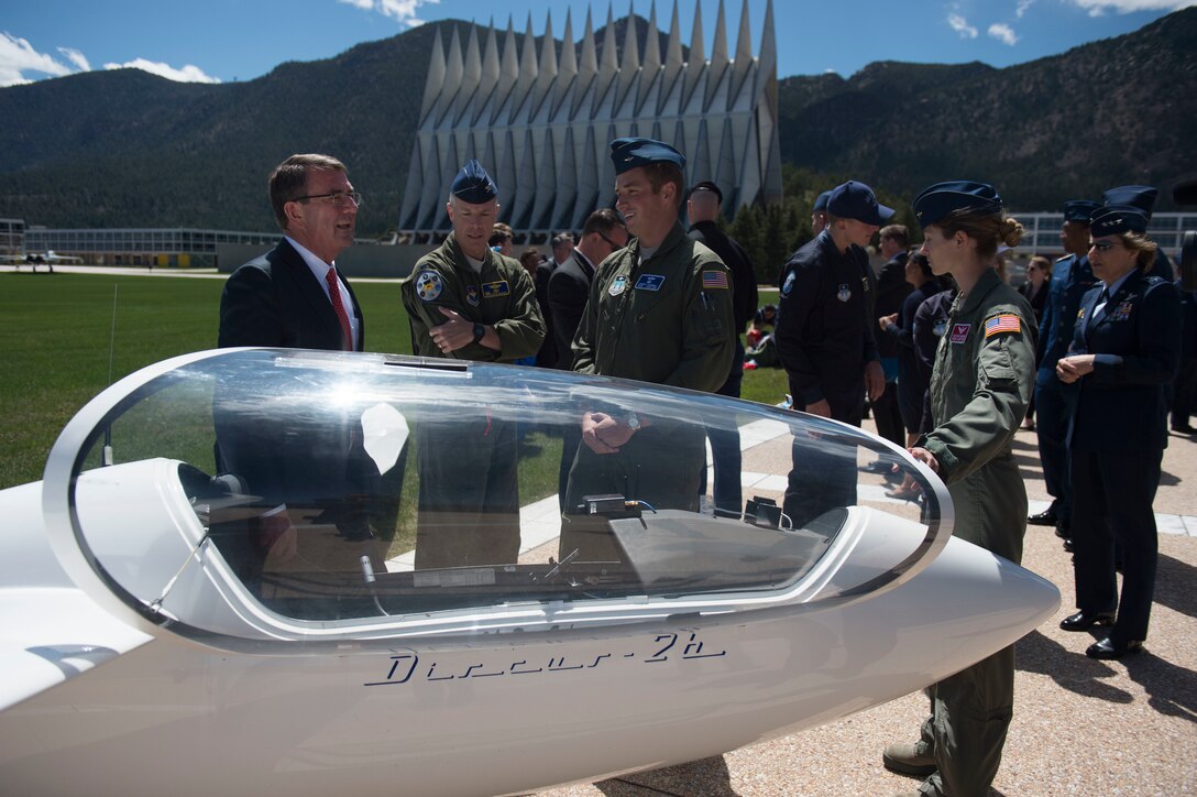 Defense Secretary Ash Carter listens to cadets talk about a training glider at the U.S. Air Force Academy in Colorado Springs, Colo., May 12, 2016. DoD photo by Air Force Senior Master Sgt. Adrian Cadiz