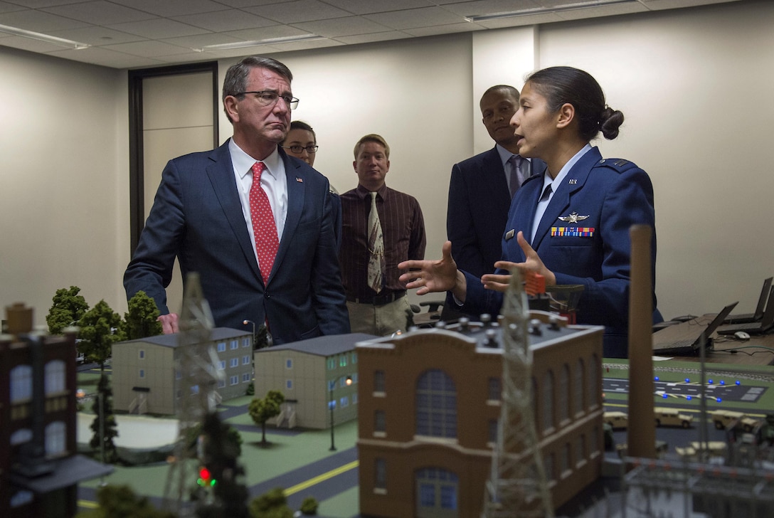 Defense Secretary Ash Carter listens to a briefing on the U.S. Air Force Academy curriculum during a visit to the campus in Colorado Springs, Colo., May 12, 2016. DoD photo by Air Force Senior Master Sgt. Adrian Cadiz