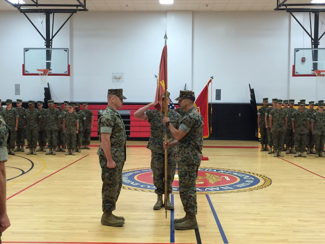 On May 13, 2016 Captain Zack A. Pinkerton (right) relinquishes command of Headquarters and Service Company (H&S Co), Marine Corps Engineer School to Captain Mark Kand (left).    