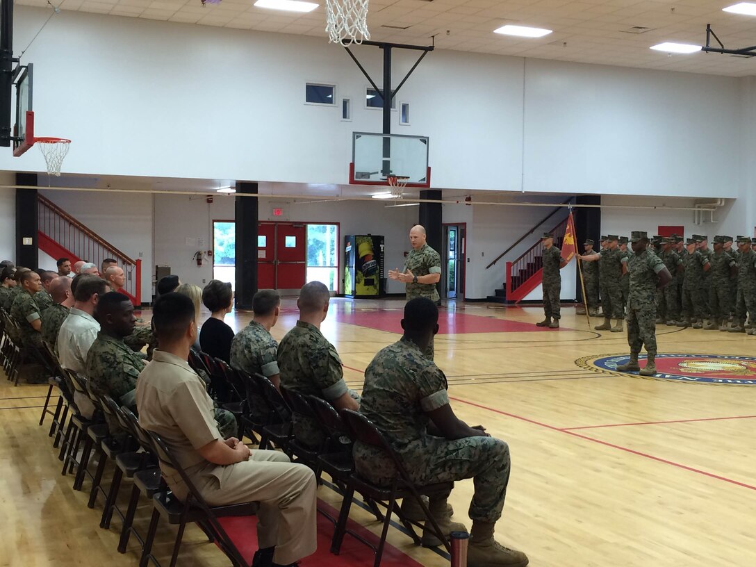 As part of the Headquarters and Service Company (H&S Co) Change of Command Ceremony Captain Mark Kand, the incoming Company Commander; addresses the Marines, Sailors, and civilians in attendance.