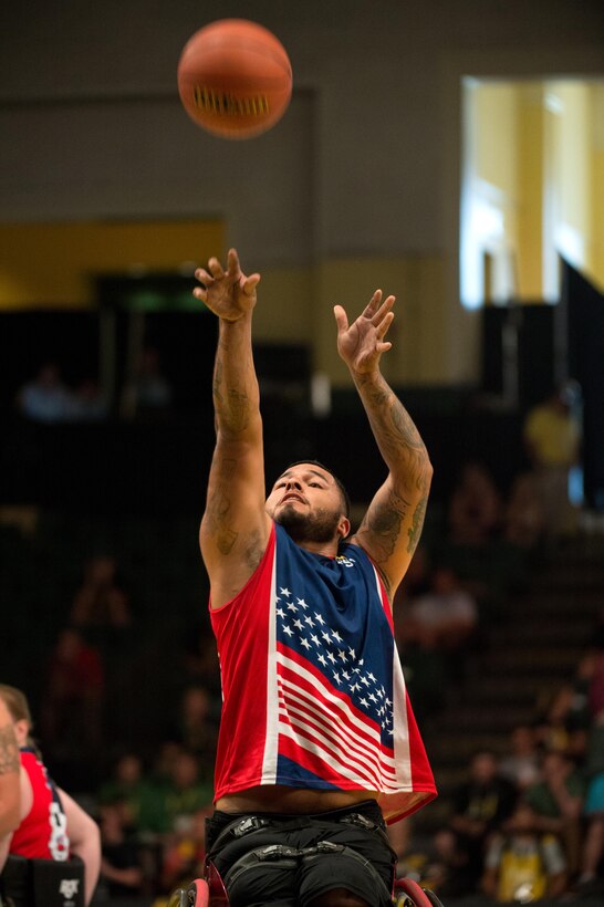 Marine Corps veteran Jorge Salazar takes a free throw during the wheelchair basketball gold medal match at the 2016 Invictus Games in Orlando, Fla., May 12, 2016. DoD photo by E. Joseph Hersom