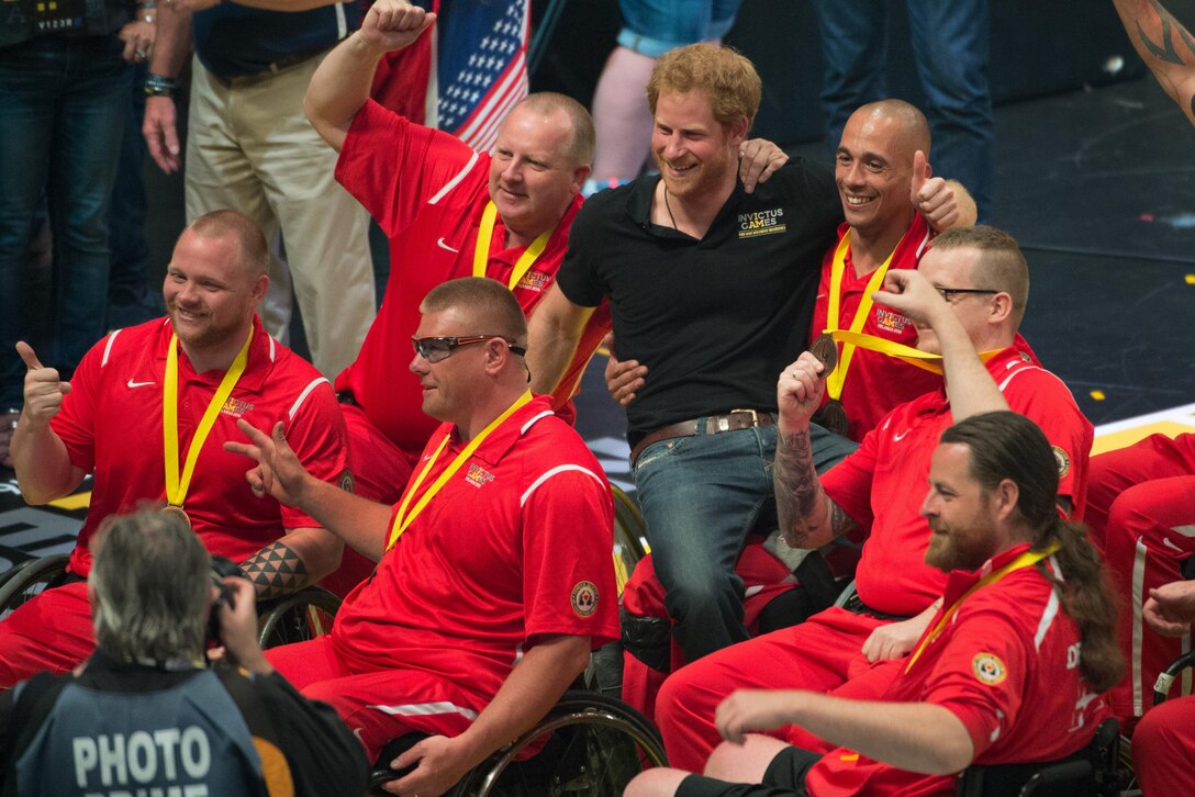 Prince Harry poses for a photo with members of the Danish team after the medal ceremony for wheelchair basketball at the 2016 Invictus Games in Orlando, Fla., May 12, 2016. DoD photo by E. Joseph Hersom