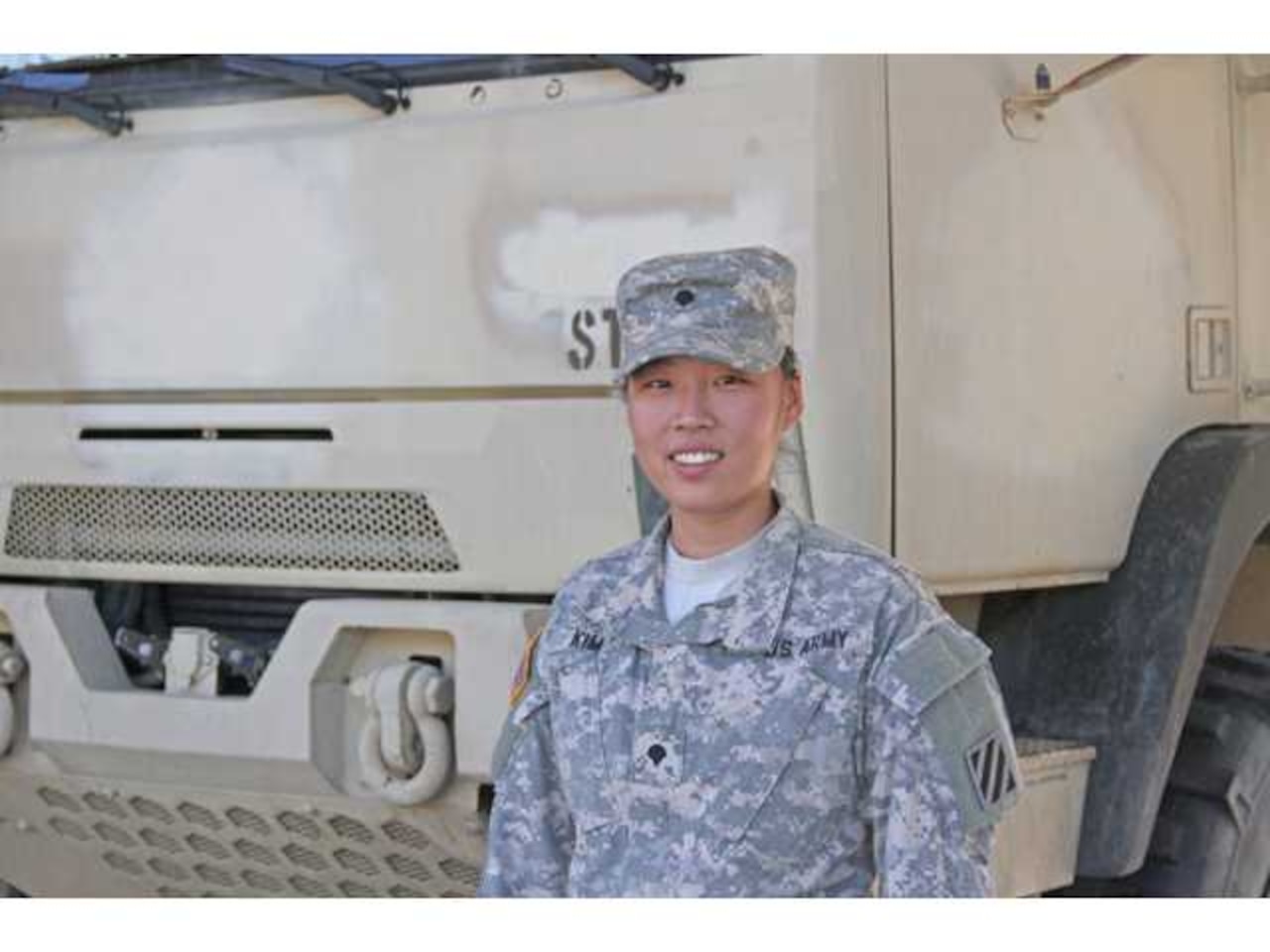 Army Spc. Angela Kim, a health care specialist and unit armorer with Headquarters and Headquarters Company, 9th Brigade Engineer Battalion, 2nd Infantry Brigade Combat Team, 3rd Infantry Division, poses for a photo at Fort Stewart, Ga, May 6, 2016. “If I could tell my younger self something,” Kim said, “it would be not to take too long planning and being afraid of something new, because I have really found something that is right for me.” Army photo by Spc. Nicholas Holmes