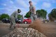 1st Lt. Lauren Lyons, 27th Special Operations Force Support Squadron Readiness and Plans chief, works on a landscaping project with another Air outside Building 600 as part of Wing Beautification Day May 13, 2016, at Cannon Air Force Base, N.M. From maintenance to medical, flyers to finance, members of the 27th SOW took time out of their day to clean-up the Cannon Community. (U.S. Air Force photo/Staff Sgt. Alexx Pons)
