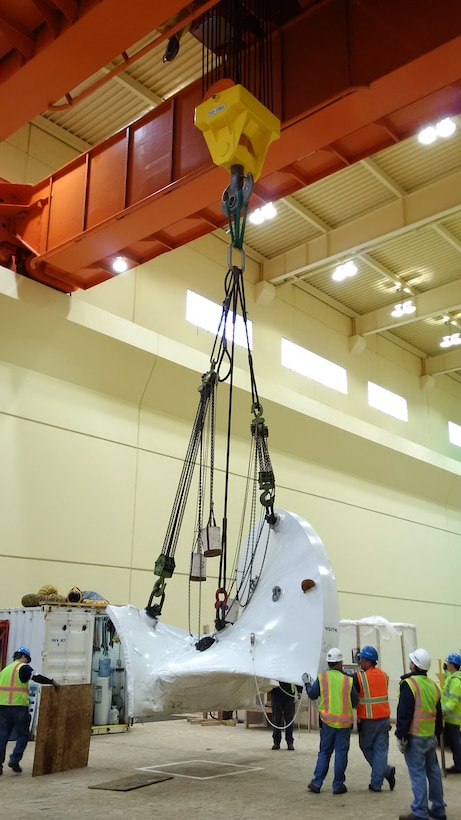 The new, high-tech replacement turbine for Ice Harbor’s hydroelectric generator Unit-2 was delivered in segments by truck and assembled inside the powerhouse. 

