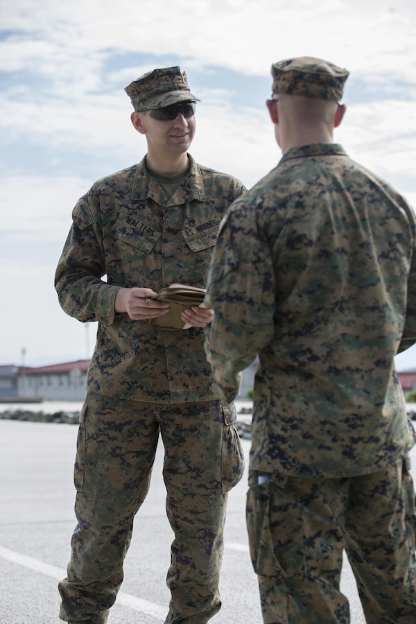Lance Cpl. Ross Walters (left), military police with 4th Law Enforcement Battalion, Force Headquarter Group, Marine Forces Reserve, and Lance Cpl. Wyatt Price (right), military police, with 4th LE Bn., FHG, MARFORRES, practice tactical questioning techniques during counter improvised explosive device training at exercise Platinum Wolf 2016, on Peacekeeping Training Operations Center South Base in Bujanovac, Serbia, May 10, 2016. Classes are given from various instructors to the partnering nations of Bosnia, Bulgaria, Macedonia, Montenegro, Slovenia, Serbia and the United States. The purpose of the exercise is to practice peacekeeping operations and develop interoperability between nations. (U.S. Marine Corps photo by Sgt. Sara Graham)