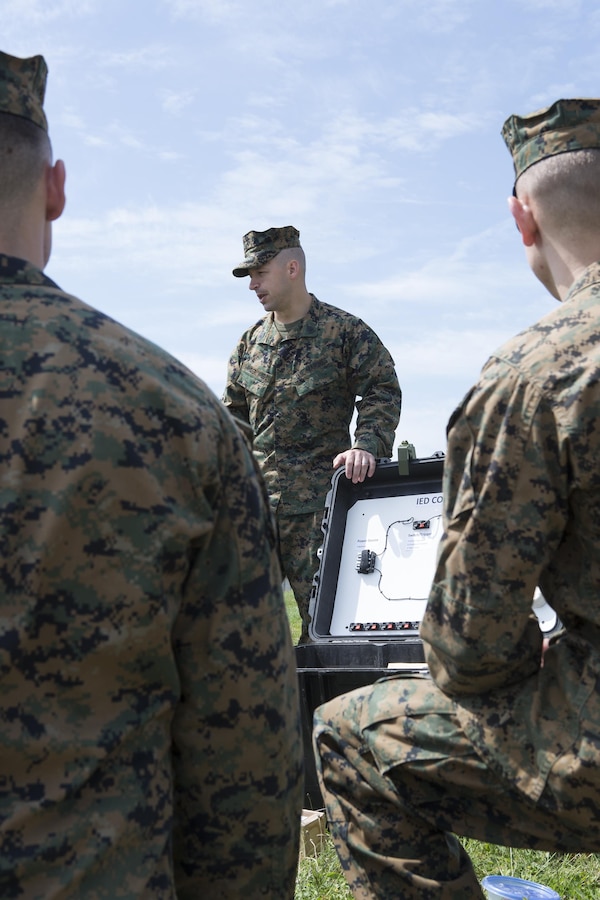 Gunnery Sgt. Kevin Vander Wiede, an accident investigation chief with Detachment 2, Headquarters Company, 4th Law Enforcement Battalion, gives a class on the components of an improvised explosive device to the Reserve Marines of 4th LE Bn., Force Headquarters Group, Marine Forces Reserve, during exercise Platinum Wolf 2016 at the Peacekeeping Training Operations Center South Base in Bujanovac, Serbia, May 10, 2016. The Marines joined six other partner nations including Bosnia, Bulgaria, Macedonia, Montenegro, Slovenia and Serbia to conduct peacekeeping operations and non-lethal weapons training over the course of two weeks. (U.S. Marine Corps photo by Sgt. Sara Graham)