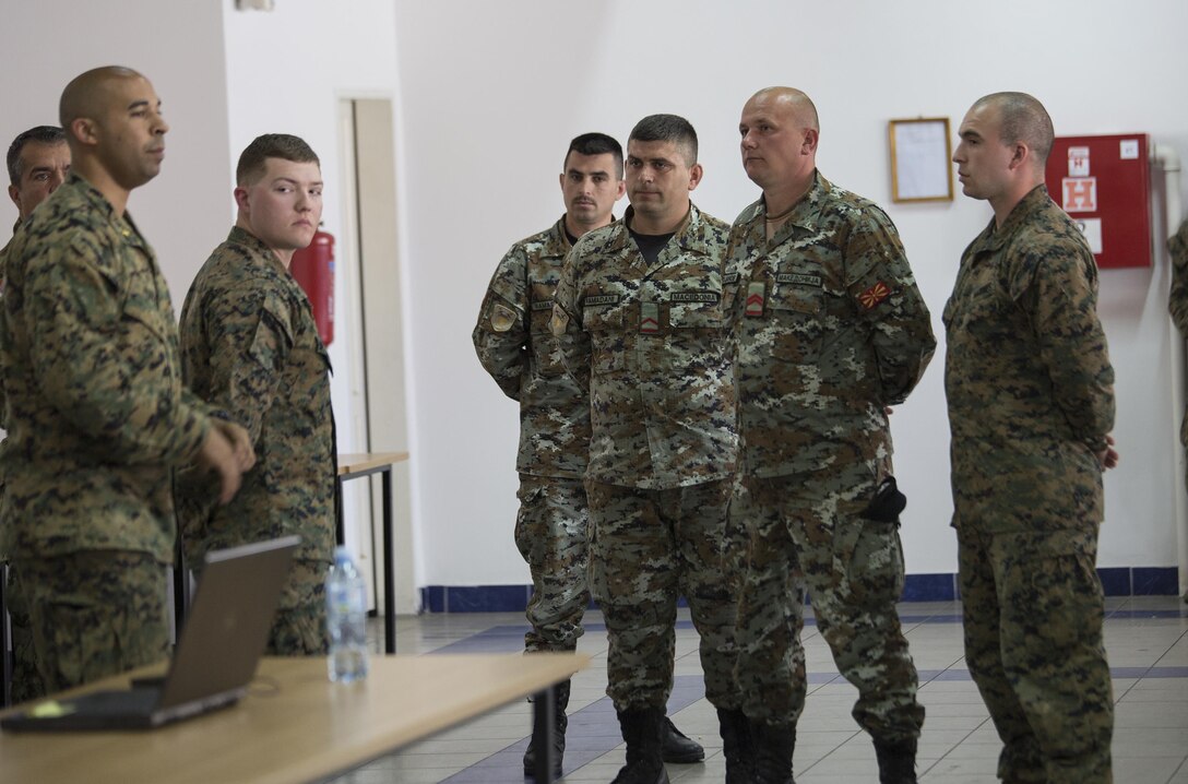 Reserve Marines with 3rd Civil Affairs Group, Force Headquarters Group, Marine Forces Reserve, teach a class on key leader engagement to Marines with 4th Law Enforcement Battalion, FHG, MARFORRES, Bosnian soldiers and Bulgarian soldiers during exercise Platinum Wolf 2016 at Peacekeeping Training Operations Center South Base in Bujanovac, Serbia, May 10, 2016.The exercise aims to provide training on peacekeeping operations and enhance interoperability between all of the participating nation including Bosnia, Bulgaria, Macedonia, Montenegro, Slovenia, Serbia and the United States. (U.S. Marine Corps photo by Sgt. Sara Graham)