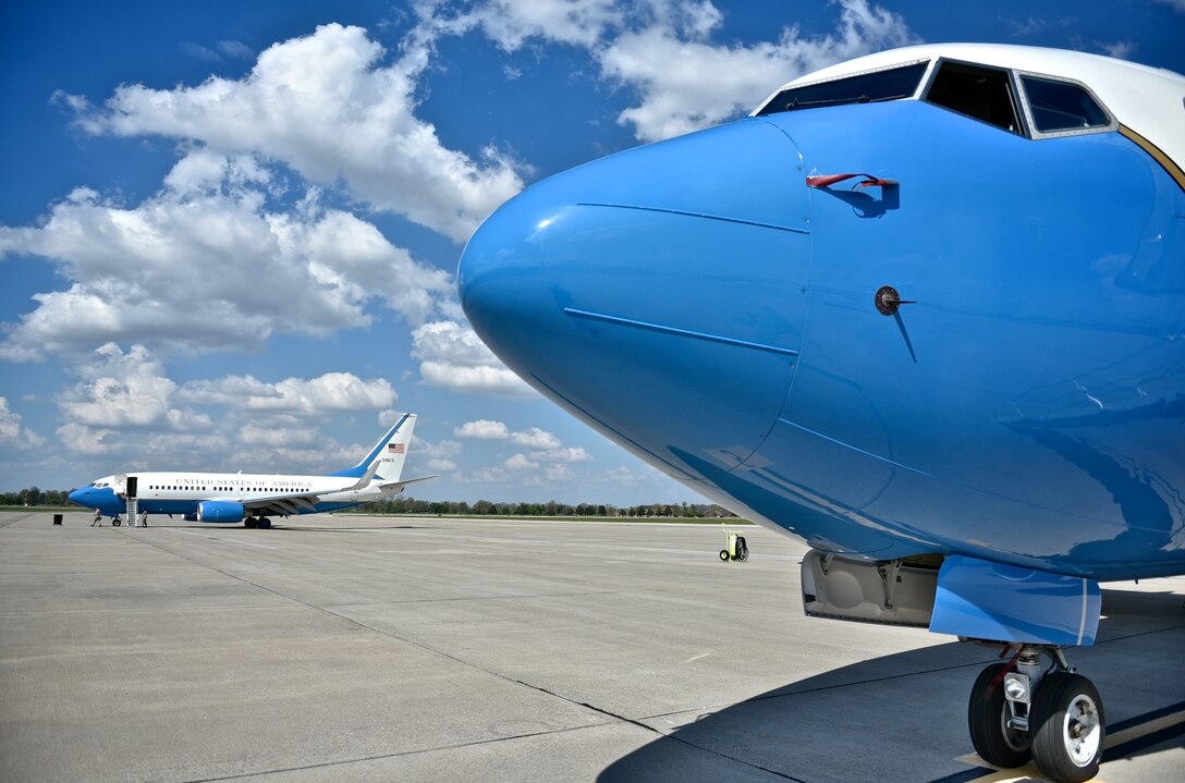A blustery spring day on the flight line as one C-40 is prepped for a static display and another awaits a mission, April 15, 2016, Scott Air Force Base, Illinois.  The C-40C plane is used to transport DV worldwide as part of the 932nd Airlift Wing, under 22nd Air Force, Air Force Reserve Command. (U.S. Air Force photo by Christopher Parr)