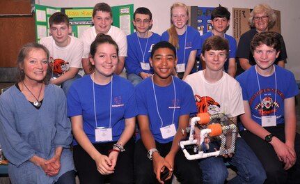 The SeaPerch competitors from Dahlgren School, along with Ann Doyle, front row left, science teacher, and Maureen Holt, back row right, social studies teacher, during a lull at the 2016 Regional SeaPerch competition at the University of Mary Washington in Fredericksburg. 