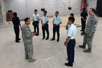 ANDERSEN AIR FORCE BASE, Guam (May 10, 2016) - Participants of a Pacific Unity multilateral tilt-up construction workshop tour a facility built with the tilt-up construction method at Andersen Air Force Base.  Pacific Unity engagements facilitate the building of military partnerships, building capacity, and increasing interoperability among the U.S. Air Force and participating nations. Tilt-up construction is a building technique that uses concrete panels which are made horizontally on the ground and then tilted up into their vertical position at the building site.