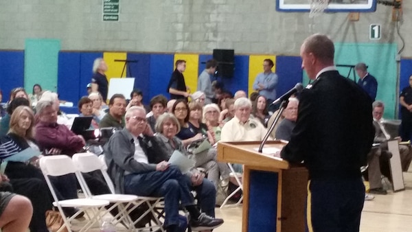 Los Angeles District commander Col. Kirk Gibbs briefs local community members about the District's draft Environmental Assement during the City of Los Angeles and the U.S. Army Corps of Engineers Los Angeles District  public meeting in the Balboa Sports Center, in Encino, Calif., May 10. The meeting provided additional information on the proposed AngelFest event, a three-day music and arts festival in Sepulveda Basin, and allowed the public to submit written comments and allowed the district commander to actively listen to anyone wishing to make an oral comment on the proposed action. 