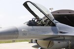 KUNSAN AIR BASE, Republic of Korea (May 11, 2016) - Major Baiyln Beck, 8th Fighter Wing Director of Staff, climbs into an F-16 Fighting Falcon at Kunsan Air Base for Exercise Buddy Wing 16-4. Buddy Wing exercises are conducted at various Republic of Korea Air Force (ROKAF) and U.S. Air Force bases multiple times throughout the year in order to practice interoperability between the U.S. and the ROKAF. 