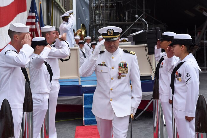 160513-N-UK333-232  SAN DIEGO (May 13, 2016) Lt. Cmdr. Kevin Sims is piped ashore after being relieved by Lt. Cmdr. Zachary Harry as commanding officer of the auxiliary repair drydock, medium, Arco (ARDM 5) in a time-honored change of command ceremony held at Naval Base Point Loma, May 13. Arco is the second drydock to bear the name Arco and was built by the Todd Pacific Shipyard Corporation, Seattle, Washington. It was placed in service on June 23, 1986, and currently has a crew of 104. (U.S. Navy photo by Mass Communication Specialist 1st Class Ronald Gutridge/Released)