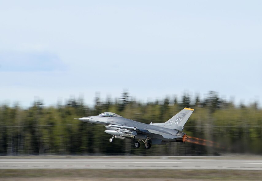 A U.S. Air Force F-16 Fighting Falcon assigned to the 80th Fighter Squadron out of Kunsan Air Base, Republic of Korea, takes off from Eielson Air Force Base, Alaska, May 4, 2016, during RED FLAG-Alaska (RF-A) 16-1. RF-A is a series of Pacific Air Forces commander-directed field training exercises for U.S. and partner nation forces, enabling joint and international units to sharpen their combat skills by flying simulated combat sorties in a realistic threat environment inside the Joint Pacific Alaska Range Complex, the largest instrumented air, ground and electronic combat training range in the world. (U.S. Air Force photo by Master Sgt. Karen J. Tomasik/Released)