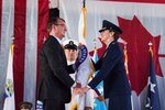 Defense Secretary Ash Carter hands the U.S. Northern Command flag to Air Force Gen. Lori J. Robinson during a change-of-command ceremony at Peterson Air Force Base, Colo., May 13, 2016. Carter presided as Robinson took command of North American Aerospace Defense Command and Northcom from Navy Adm. Bill Gortney. DoD photo by Air Force Senior Master Sgt. Adrian Cadiz