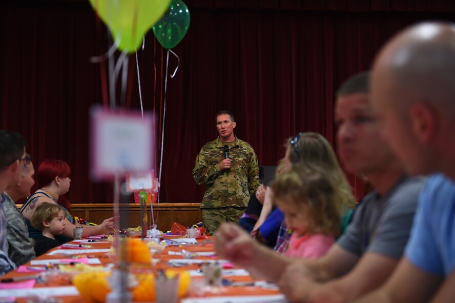 Joint Base Lewis-McChord Commander Col. Daniel Morgan, speaks during the Team McChord Deployed Families Dinner at the Chapel Support Center at Joint Base Lewis-McChord, Wash., May 10, 2016. The quarterly event provides a different themed meal, entertainment and activities for McChord members and their families. (U.S. Air Force photo/Staff Sgt. Naomi Shipley)
