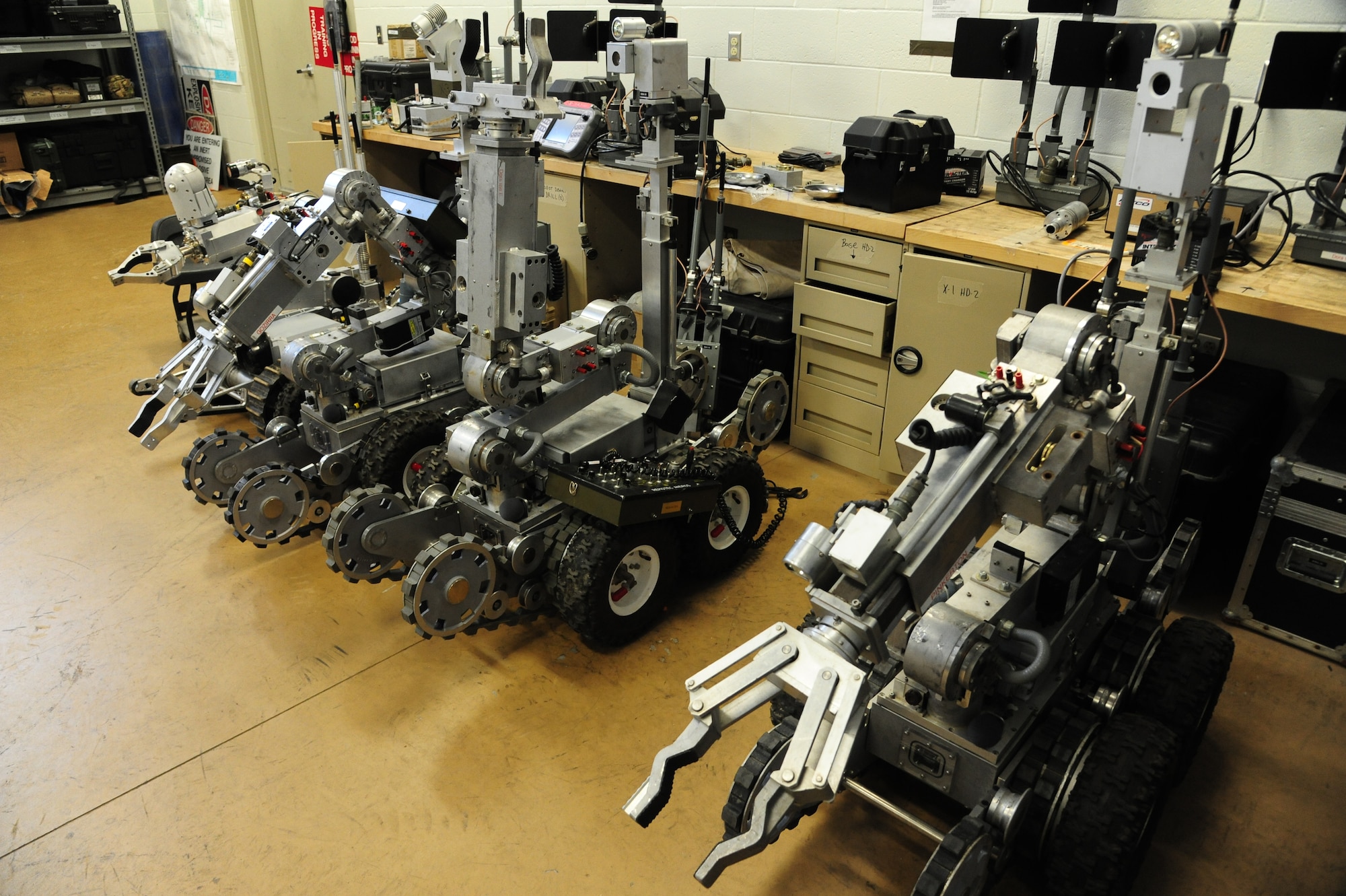 F6A and HD2 robots sit dormant at Whiteman Air Force Base, Mo., May 10, 2016. The robots are capable of moving certain pieces of ordnance, depending on weight, to safer locations. (U.S. Air Force photo by Airman 1st Class Keenan Berry) 