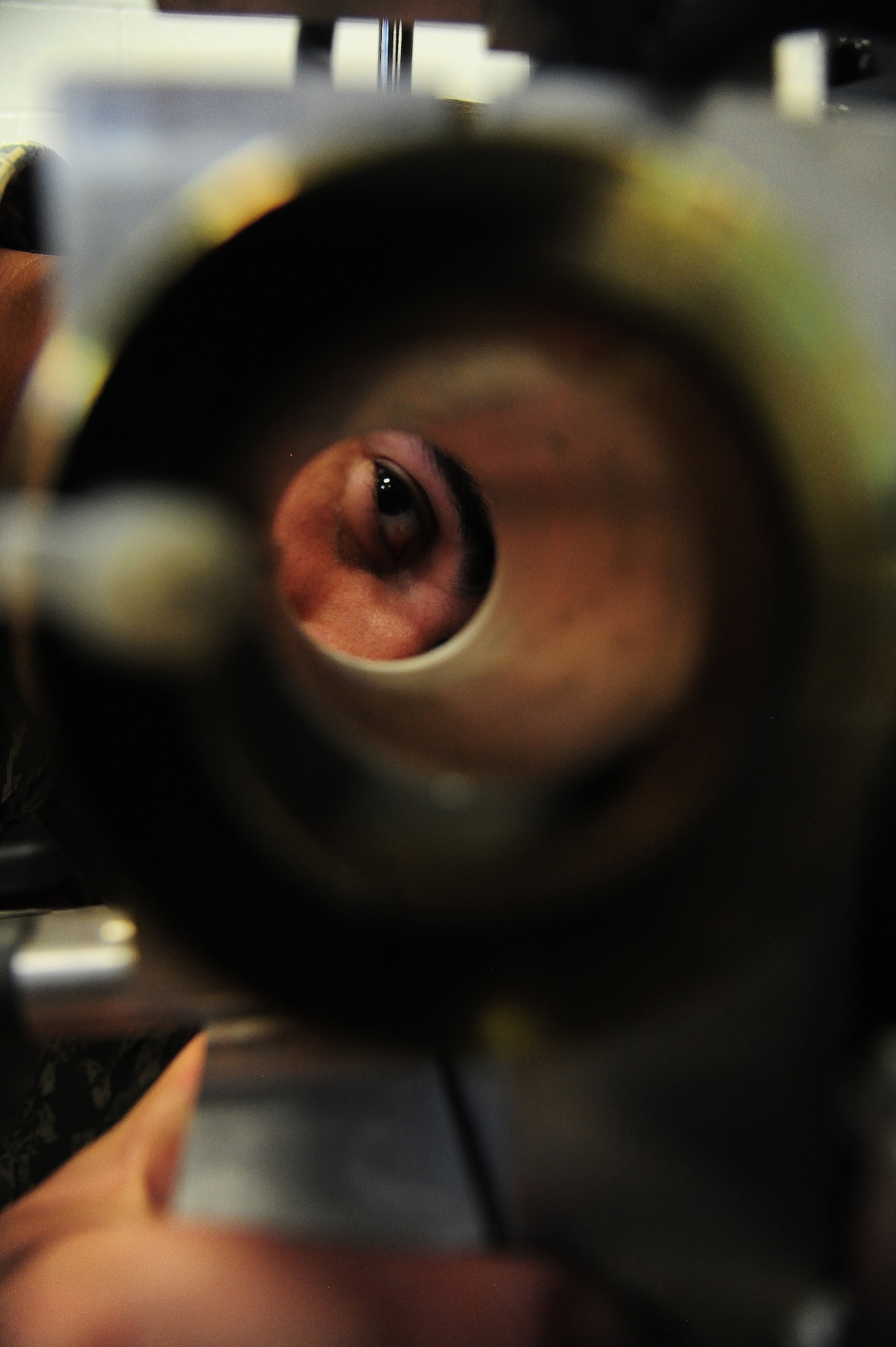 U.S. Air Force Airman 1st Class Conner Walsh, a 509th Civil Engineer Squadron explosive ordnance disposal team member, inspects the barrel’s bore on an HD2 robot at Whiteman Air Force Base, Mo., May 10, 2016. The robots must be inspected prior to and after each use to ensure there are no discrepancies. (U.S. Air Force photo by Airman 1st Class Keenan Berry)