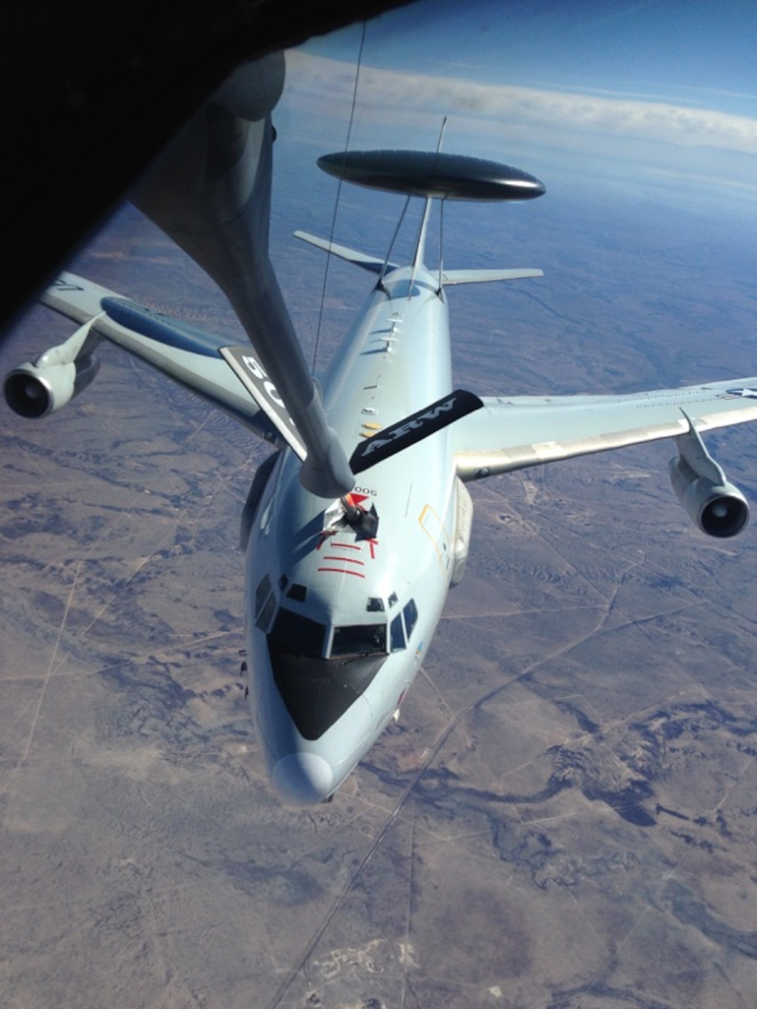 An E-3 “Sentry” Airborne Warning and Control System aircraft flown by crewmembers assigned to the 552nd Air Control Wing at Tinker Air Force Base takes part in an aerial refueling mission on Jan. 19 in the skies over north Texas, as part of a Congressional staff delegation flight performed by members of the 507th Air Refueling Wing, also stationed at Tinker. (Air force photo by Darren D. Heusel/Released)